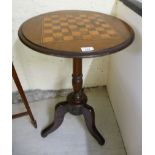 A late Victorian mahogany pine pedestal table with an inlaid chequerboard top,