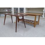 A 'vintage' design mahogany finished coffee table of lozenge form,