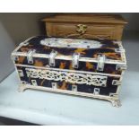 An early 20thC Anglo-Indian tortoiseshell and bone clad trinket box,