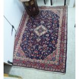Two similar Persian rugs,