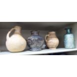 Three dissimilar 'antique' ceramic vessels: to include two jugs with loop handles 9''h;