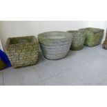 Four similar composition stone planters various forms and sizes F