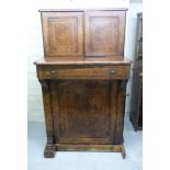 A late Victorian figures and string inlaid walnut Davenport,