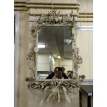 A 1950s French mirror, the rectangular plate set in a cream painted steel frame,