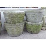 A set of four composition stone planters 11''h 16''dia F