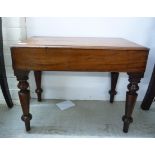 An early Victorian mahogany night commode with a removable box top and china liner,