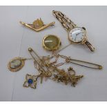 Gold and yellow metal items of personal ornament: to include an Australian tie pin,