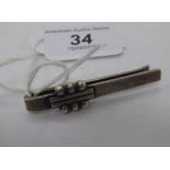A 1950s Georg Jensen & Wendel Sterling silver tie clip with uniformly applied bead ornament