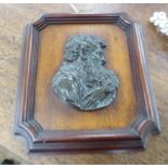 A 19thC cast and patinated bronze plaque, the profile portrait of a bearded man,