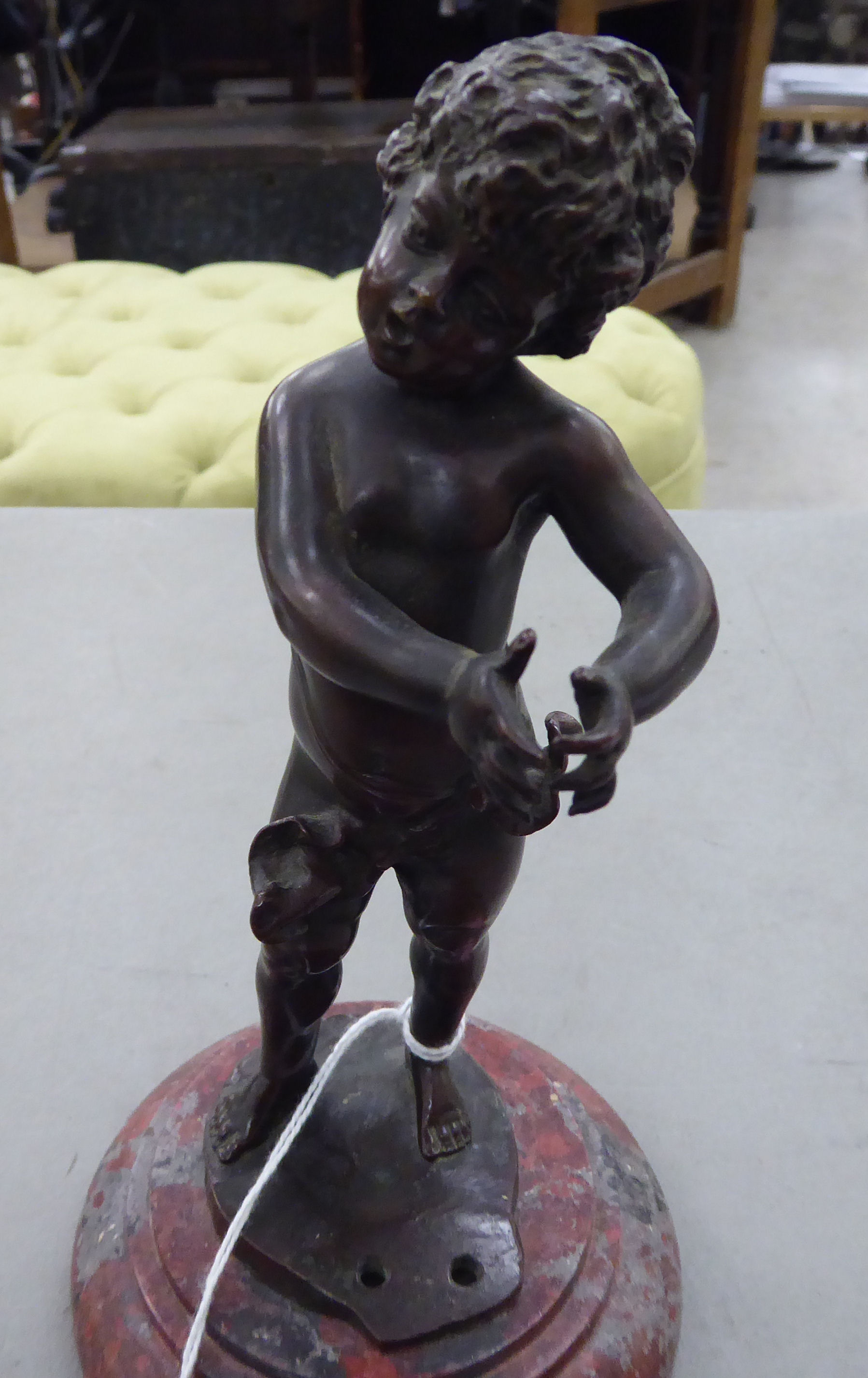 Franz Ifland - a cast and patinated bronze, a standing cherubic figure, on a turned, - Image 2 of 4