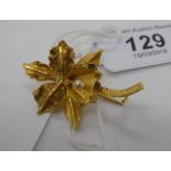 An 18ct gold leaf design brooch,