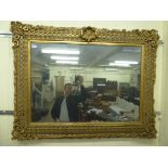 A 19thC design mirror in an elaborately gilded frame with pierced ornament 52'' x 41'' HLSB