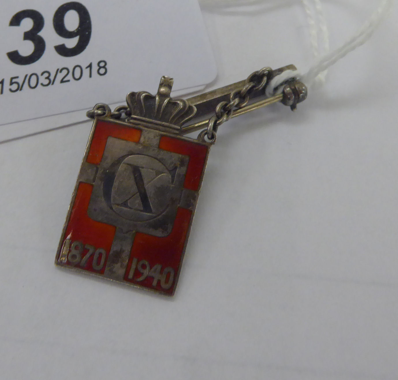 A 1940s Georg Jensen Sterling silver and enamelled red pendant on a bar brooch,