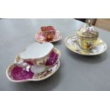 A late 19th/early 20thC miniature Coalport china cabinet cup and saucer,