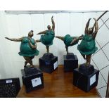 A set of four patinated and painted bronze figures, ballet dancers, striking various poses,