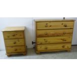 A modern honey coloured pine dressing chest, the four long drawers with bun handles,