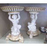 A pair of late 19thC Continental moulded and gilded porcelain centrepiece bowls,