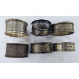 Six dissimilar silver napkin rings mixed marks 11