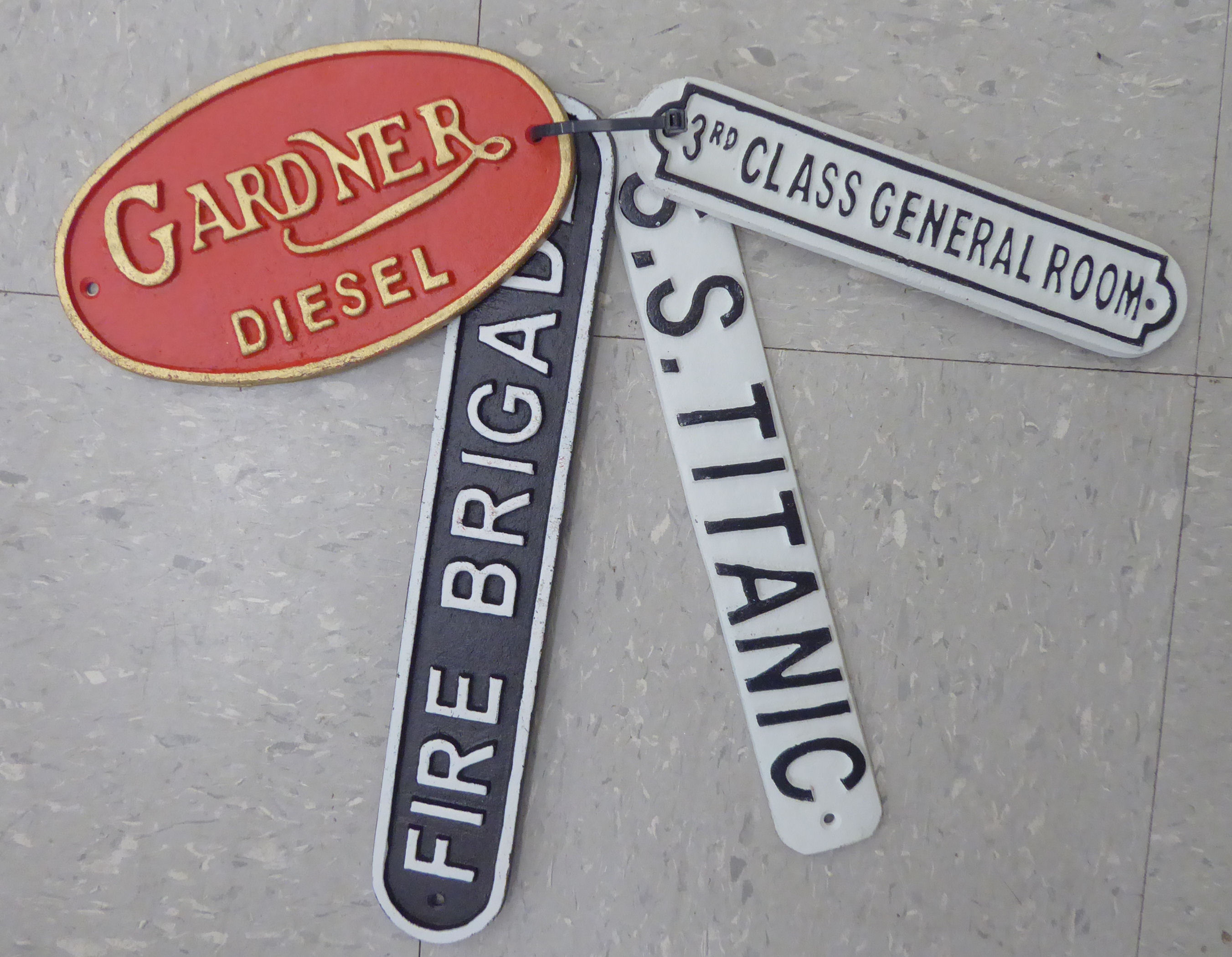 Four cast iron signs: to include ''SS Titanic' 15''w OS10