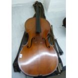 A modern cello with a one-piece back 30''h with three bows BSR