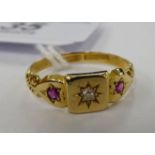 An 'antique' 18ct gold stone ruby and diamond set ring 11