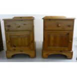 A pair of modern Ducal honey coloured pine bedside cabinets,