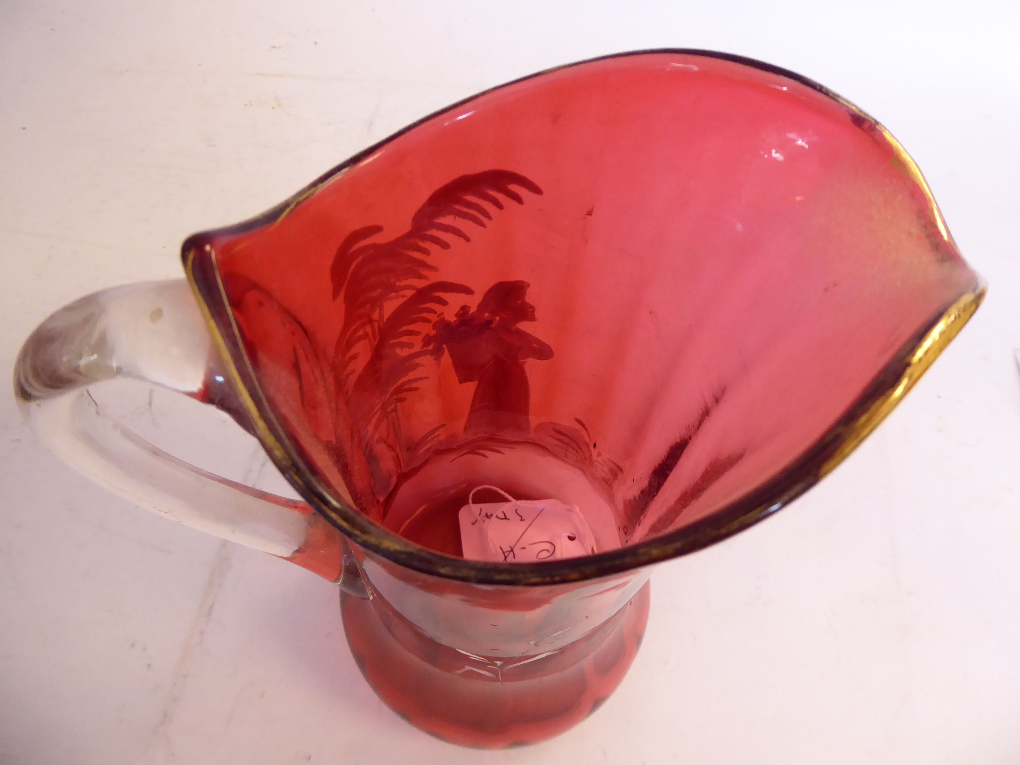 In the manner of Mary Gregory - a cranberry glass jug of waisted bulbous form, - Image 6 of 8