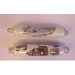 Two similar late 19thC blown glass rolling pins with internal applied, printed scrapwork,