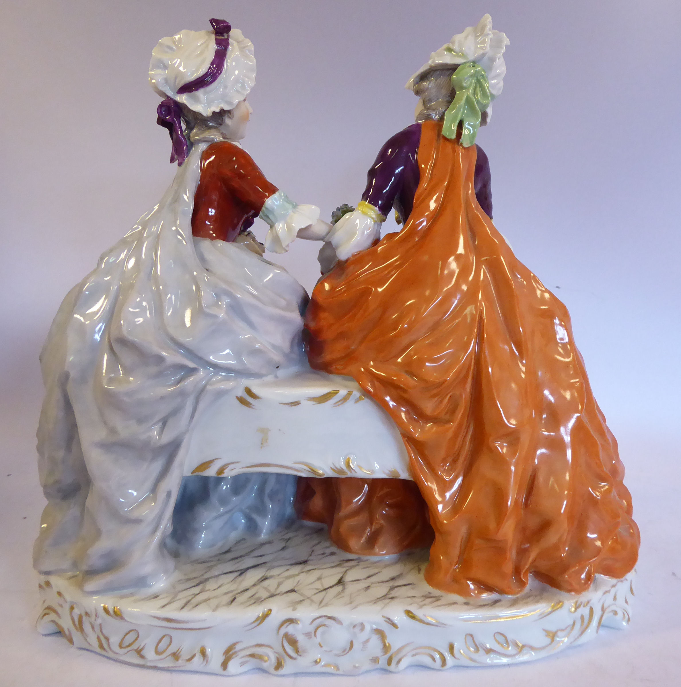 A 20thC Naples porcelain group, two seated young women wearing bonnets and floral skirts, - Image 8 of 10