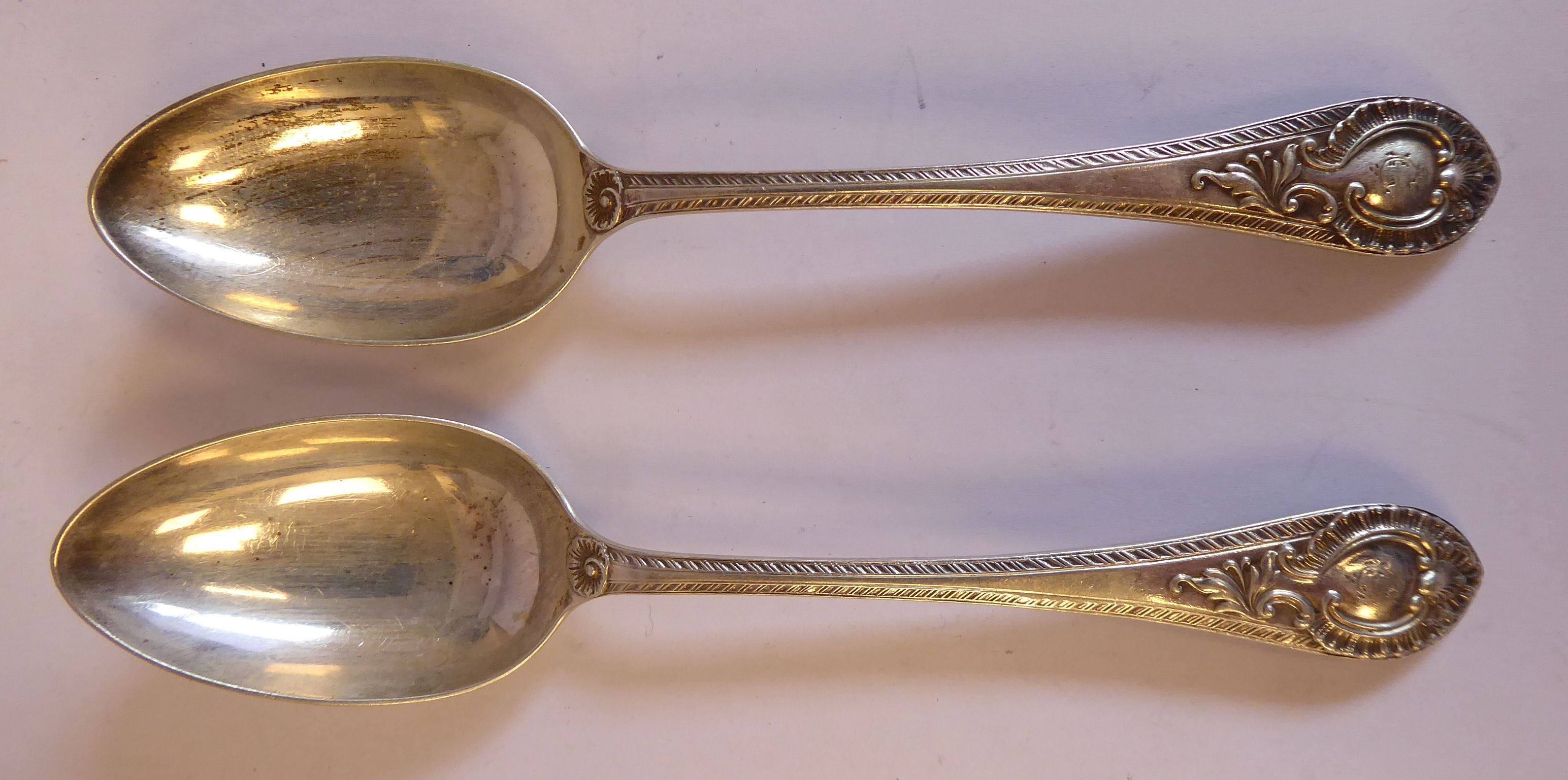 A set of twelve late Victorian silver fruit spoons, cast with shells, foliage, - Image 4 of 12
