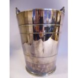 An early 20thC Elkington silver plated ice bucket of tapered, moulded band design with opposing,