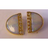 A pair of 18ct gold D-shaped earrings,