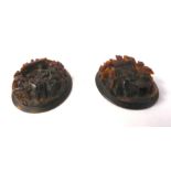 A pair of 19thC Japanese intricately carved oval tortoiseshell studies,