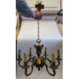 An early 20thC lacquered gilt metal chandelier,