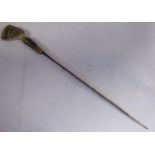 A steel skewer,