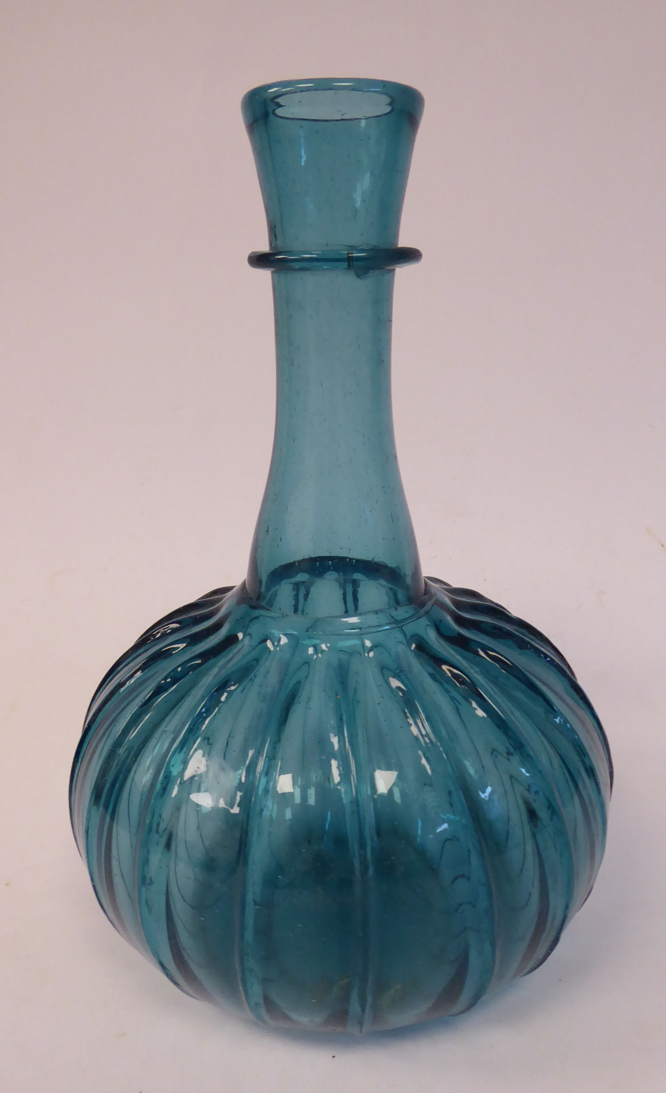 A 17thC Dutch semi-opaque turquoise glass bulbous and wide fluted bottle vase with a long, - Image 4 of 10