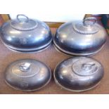 A graduated set of four late 19th/early 20thC silver plated oval meat domes with cast bead and