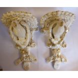 A pair of late 19thC Continental moulded, glazed and gilded Chinese wall brackets,