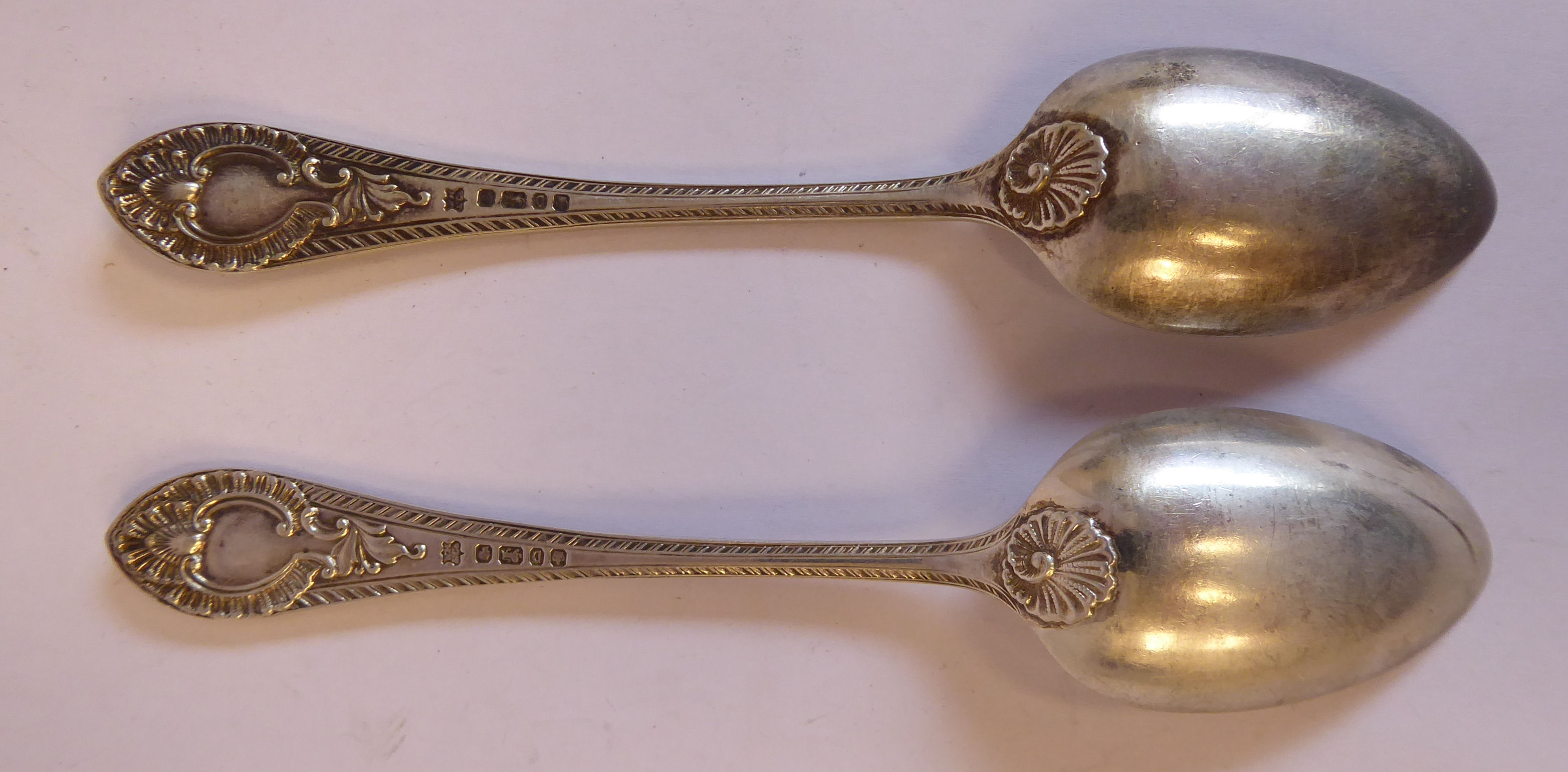 A set of twelve late Victorian silver fruit spoons, cast with shells, foliage, - Image 6 of 12