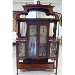 An early 20thC Art Nouveau mahogany display cabinet,