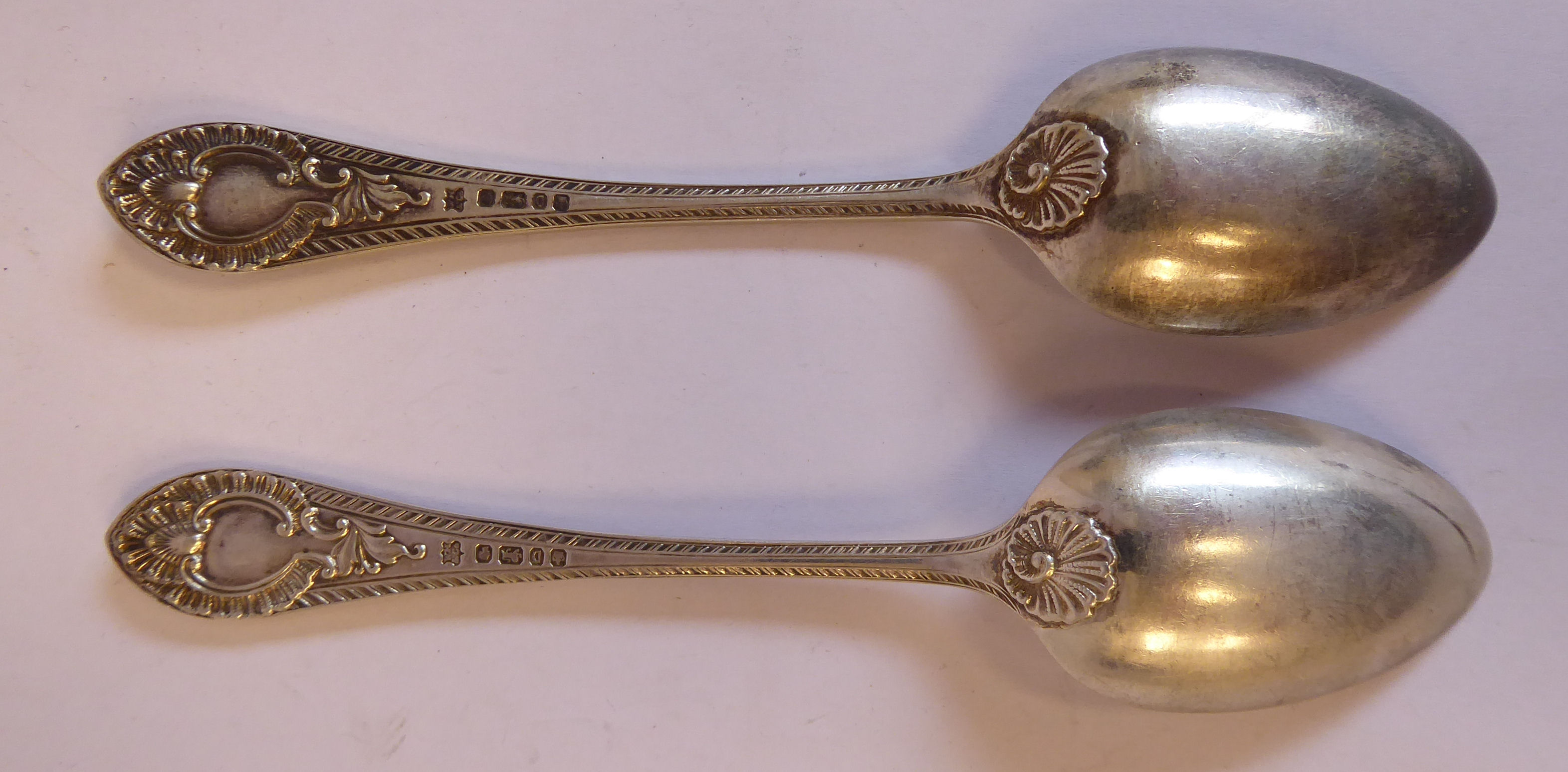 A set of twelve late Victorian silver fruit spoons, cast with shells, foliage, - Image 5 of 12