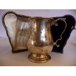 A silver Christening tankard of waisted, baluster form with a cast acanthus topped, hollow,