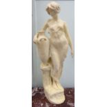 An unglazed standing plaster figure 'Aphrodite' holding a water vessel,