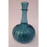 A 17thC Dutch semi-opaque turquoise glass bulbous and wide fluted bottle vase with a long,