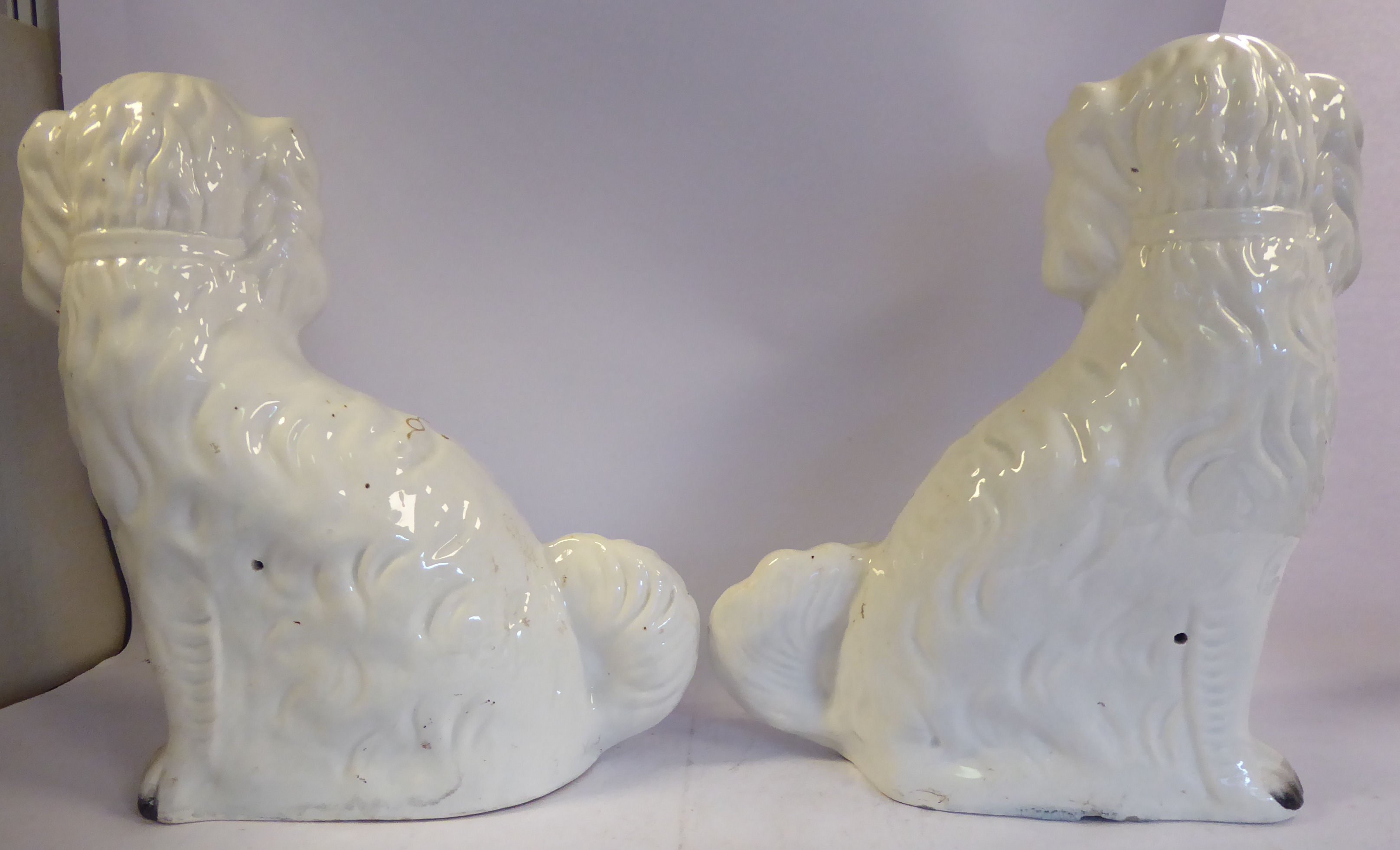 A pair of Staffordshire pottery ivory glazed, seated King Charles Spaniels with painted features, - Image 3 of 6
