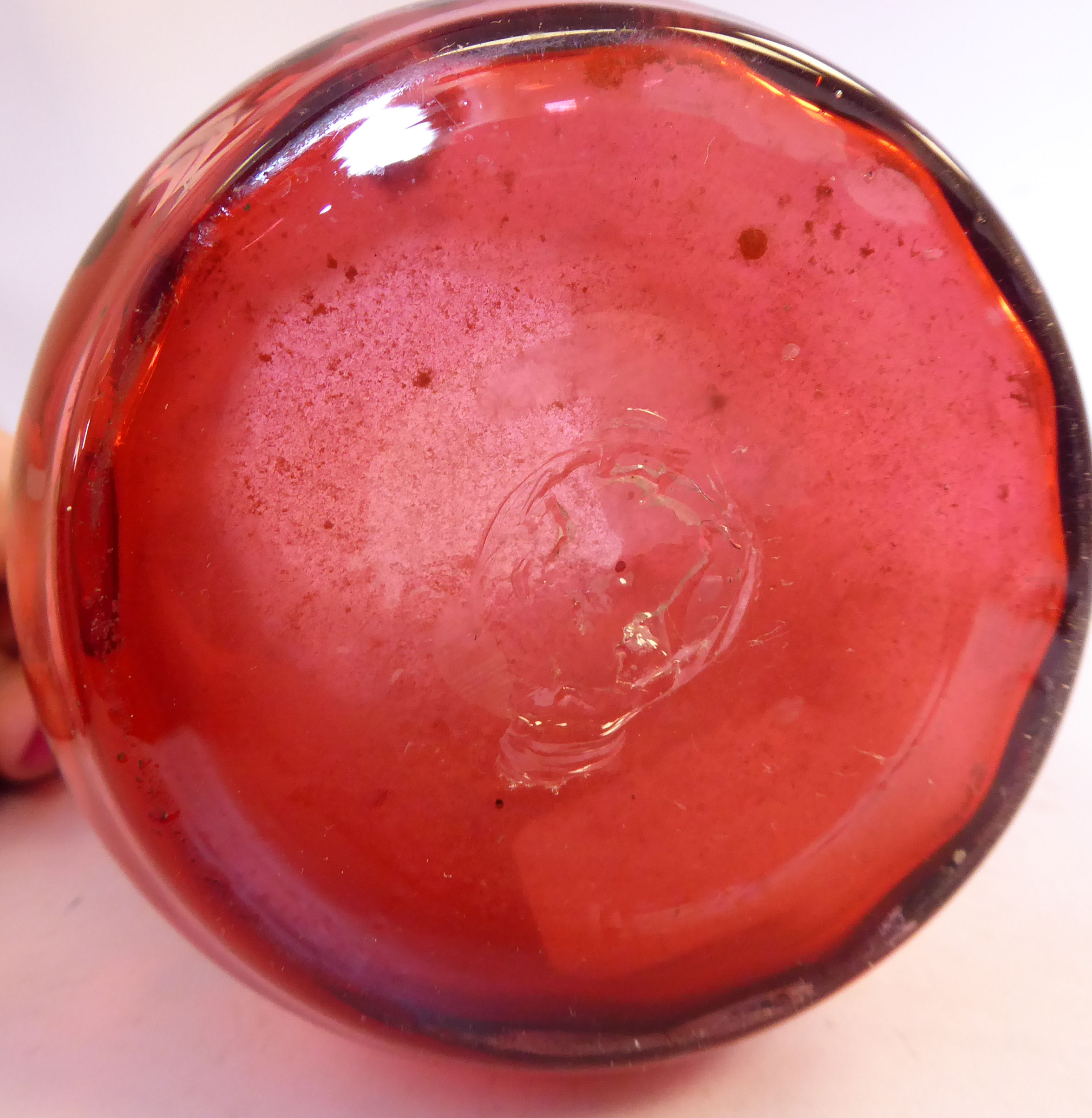 In the manner of Mary Gregory - a cranberry glass jug of waisted bulbous form, - Image 8 of 8