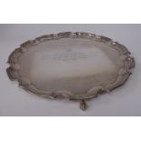 A Georgian style silver salver with a raised piecrust border,