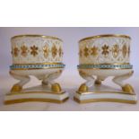 A pair of late 19thC Graingers Worcester ivory glazed and gilded porcelain,