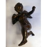 A late 19thC cast and patinated bronze kneeling figure of Cupid 10''h
