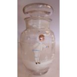 In the manner of Mary Gregory - a mutely panelled clear glass jar of baluster form,